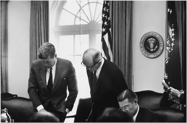 Meeting of the Executive Committe of the National Security Council- Cuba Crisis. President Kennedy, Secretary of State Dean Rusk, Secretary of Defense Robert S. McNamara. White House, Cabinet Room. Leadership quotes context: the version that survives contact with reality