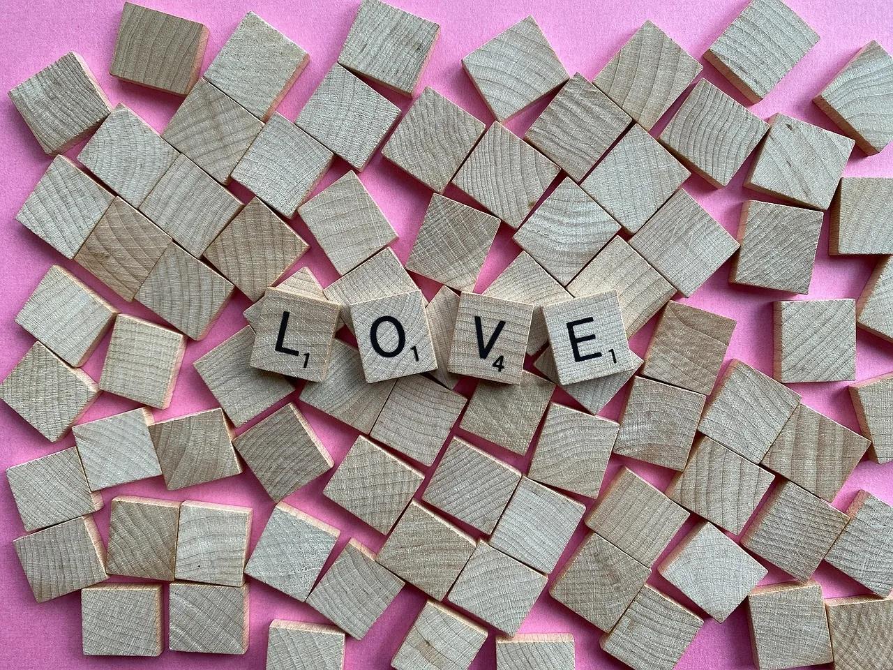 wooden letter tiles, alphabet, love, word, valentine, romance, romantic, valentine's day, letters, scrabble, letter tiles, alphabet tiles, closeup. Love quotes misquotes: a model of attribution drift