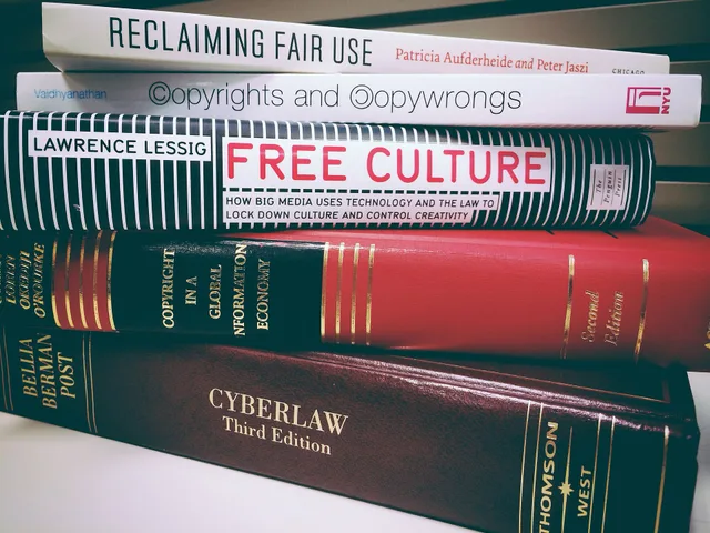 A stack of books related to copyright law, free culture, and fair use, photographed by researcher Casey Fiesler in 2014. Public domain quotes in the U.S. and the dates they became free