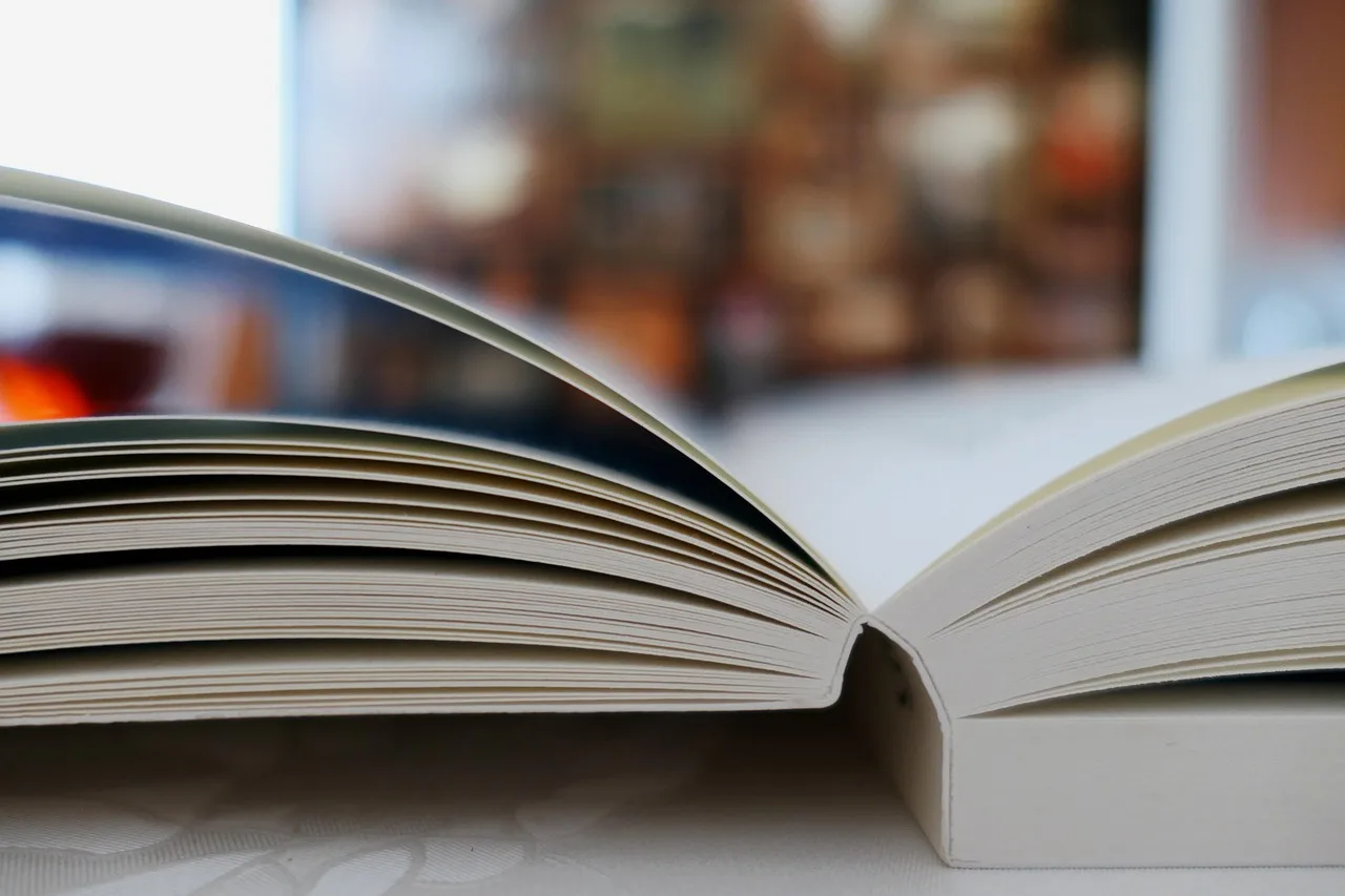 a book, read, literature, paper, book pages, text, pitched, scroll, old books, writing, leafed through, open books, library. Field guide to quote context and sources collection: the fields