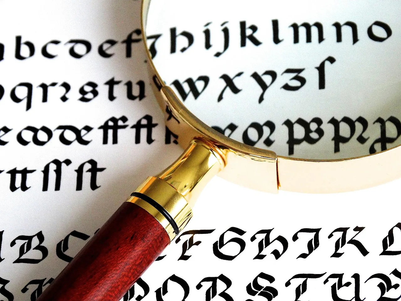 magnifying glass, enlargement, enlarge, focus, glittering, metal, wood, text, read, noble, elegant. Short misquotes and fact checks: attribution risks